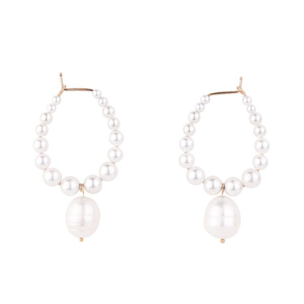 Elegant handmade pearls earrings featuring natural pearls set in premium quality and sterling silver, handmade by oana savu