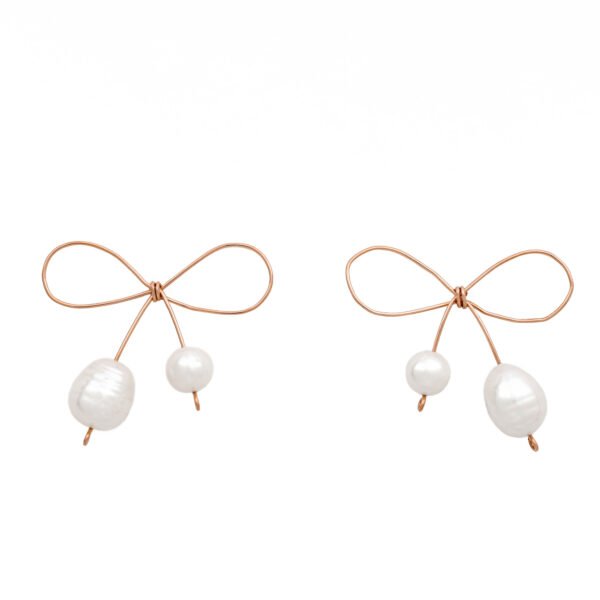 14k gold bow earrings handmade by oana savu using natural pearls ads an elegant touch to your outfit
