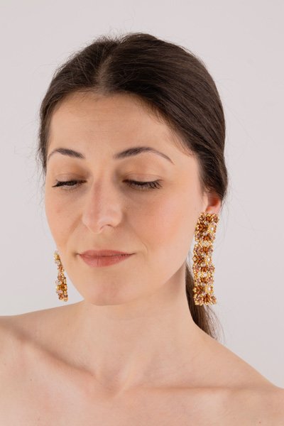 Lace Earrings - Brown Oana Savu Handmade beaded earrings. Statement silver ear-clips, featuring brown and gold glass beads, each sewn individually in order to achieve this meticulous result. These earrings can match with a daily outfit and an evening gown too.