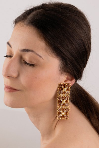 Lace Earrings - Brown Oana Savu Handmade beaded earrings. Statement silver ear-clips, featuring brown and gold glass beads, each sewn individually in order to achieve this meticulous result. These earrings can match with a daily outfit and an evening gown too.