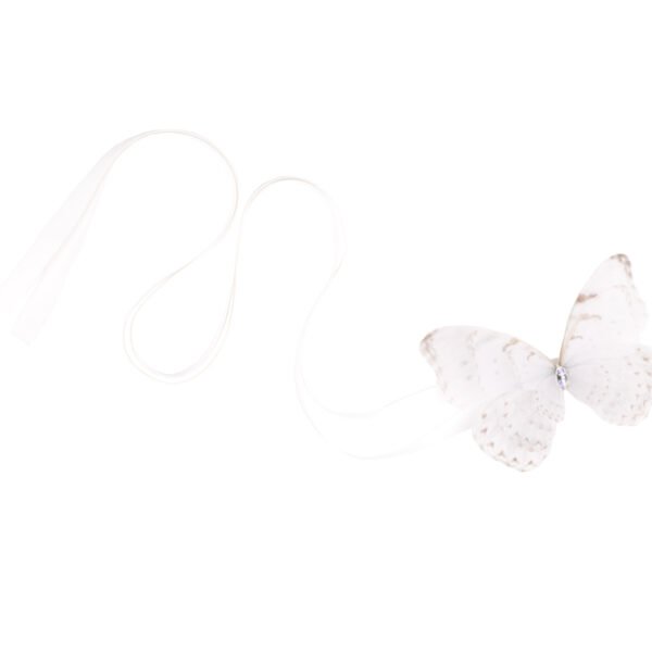 Shop Oana Savu Handmade ribbon tie accessory is sewn by hand in our little atelier near in Antwerp, Belgium. The voluminous silk butterfly worn around your neck, frames the face, adding a spark of ingenuity to any look. It is sewn on a high-quality silk satin ribbon tie, with a customizable length to fit more styles, worn around your neck - as a choker necklace, style your hair oh hot summer days, around your wrist as a bracelet or even around your waist as a belt for those light summer dresses.