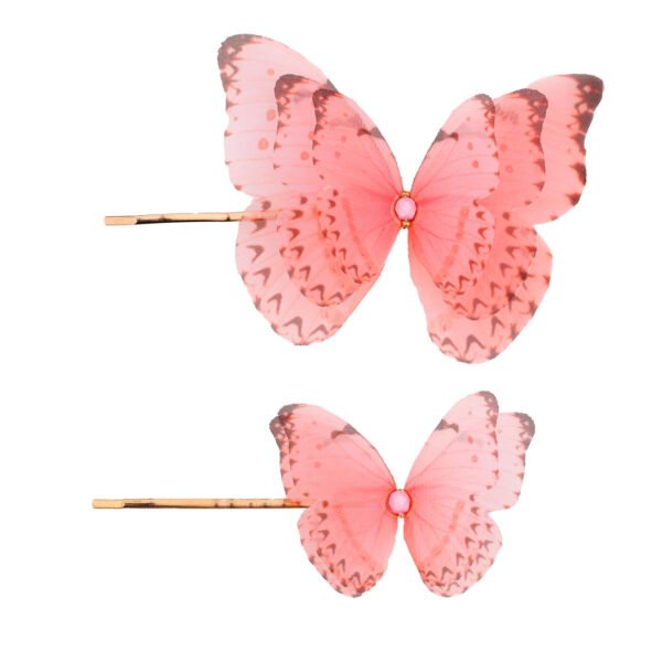 Shop Oana Savu Special bobby pin set with silk butterfly attachment, handmade by oana savu, an elegant hair accessory for women.